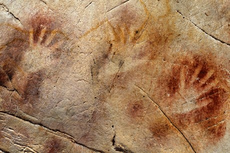 Detail of the "Panel of Hands" from the El Castillo Cave. Photo Courtesy of the University of Bristol. (Click on image to view larger.)